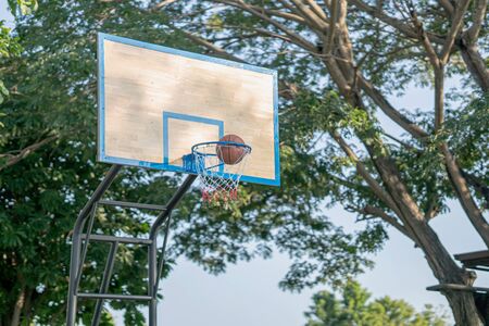 Swish - basketball goes through the hoop