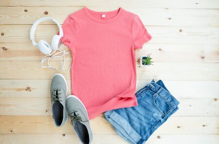 T-shirt mock up on wooden background,