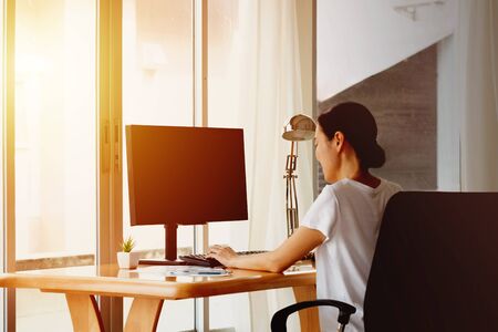 Young business woman working from home,の写真素材