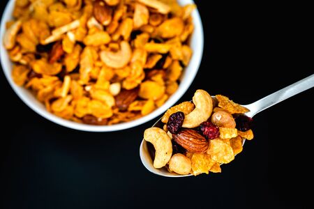 Homemade Honey caramel cornflakes in black backgroundの写真素材