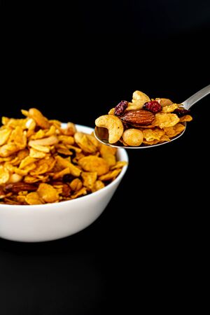 Homemade Honey caramel cornflakes in black backgroundの写真素材