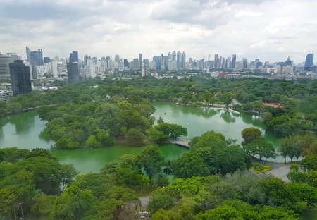 Bangkok, Thailand - October 22, 2019: Lumphini Park and the downtown Bangkok City Skyline Thailand