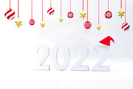 3D. 2022 font, Santa Claus hat, gift box, christmas ball At Christmas and New Year on a white backgroundの写真素材
