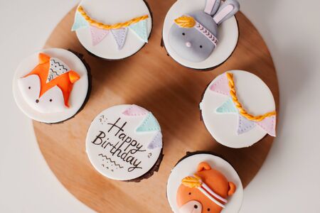 Cupcakes with mastic decor. Dessert