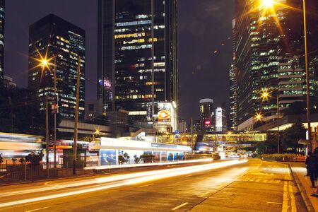 China Hong Kong 2016 December 31 Night traffic of cars on the background of skyscrapersのeditorial素材