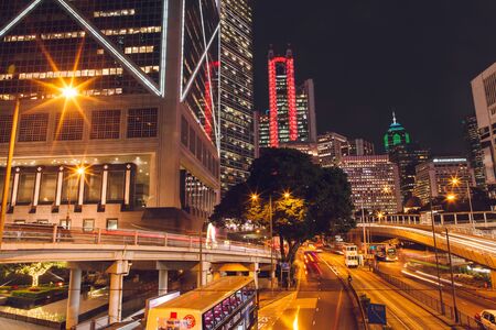 China Hong Kong 2016 December 31 Night traffic of cars on the background of skyscrapersのeditorial素材