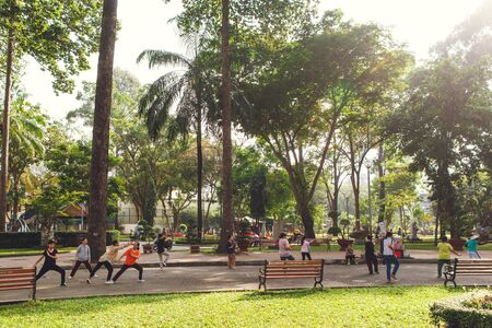 Ho Chi Minh City. Vietnam. January 11, 2017. Vietnamese people do morning exercises in the park.のeditorial素材