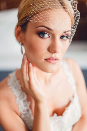 Model bride posing in a hotelの写真素材