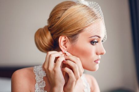 Model bride dresses an earringの写真素材