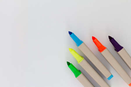 Colorful markers, highlighter markers on white background. Copy space. Back to schoolの写真素材