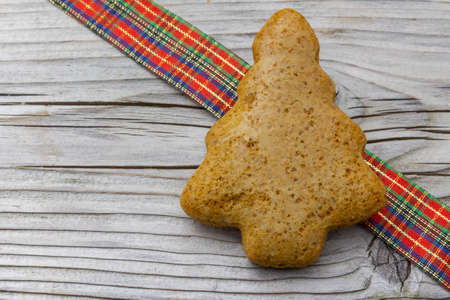 Christmas tree gingerbread isolated on white background. Christmas background. New Year theme. Merry Christmas and Happy New Year Holidays greeting card, frame, banner, copy space, sweet foodの写真素材