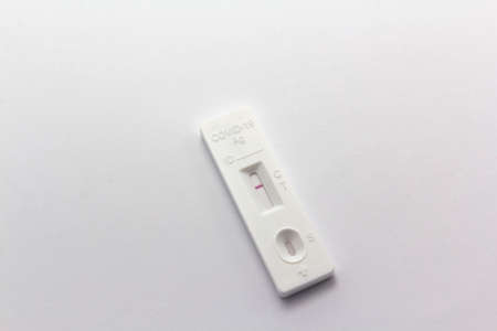Negative SARS-CoV-2 Rapid Antigen Test on white background, horizontal copy spaceの写真素材