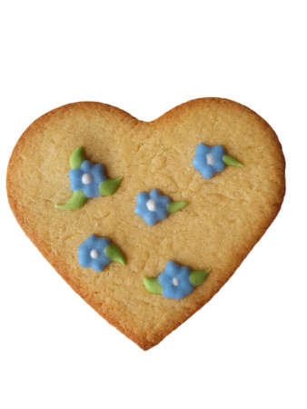 heart shaped decorated cookie isolated on white background. Valentines Day, greeting card, pastry, Copy space, top view, love conceptの写真素材