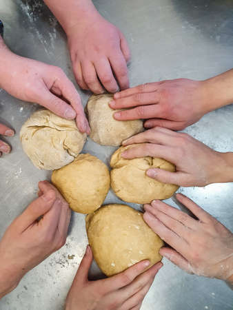 a lot of hand-made dough, teamwork, communication, message. Team building concept, banner. Pastry...