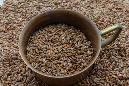flax seeds, linseed in a cup. Healthy, vegetarian, organic food, diet background, health care...