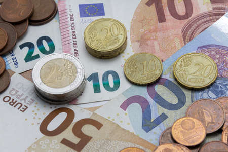Money as background, euro coins and banknotes. Money and financial conceptsの写真素材