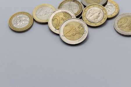 Money as background, euro coins on white background. Money and financial concepts, banner, cover, mockup, for your designの写真素材
