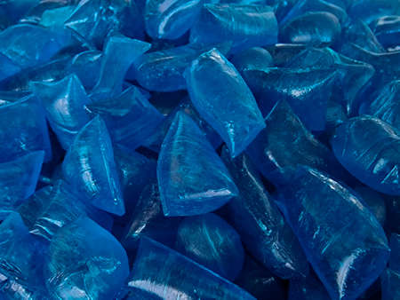 blue homemade hard candy as background, pastry, copy space, greeting card, postcard, banner, cover,...