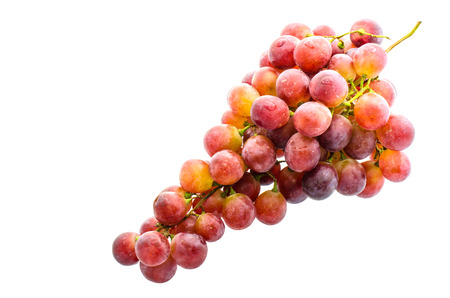 Red grapes , fresh with water drops. Isolated on white background.の写真素材