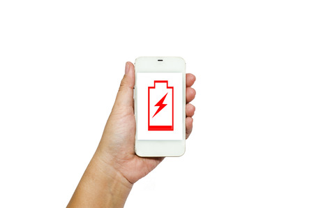 Hand holding smart phone isolated on white backgroundの写真素材