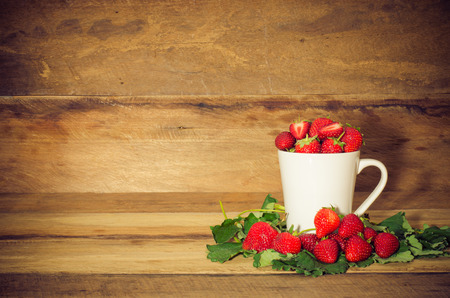 strawberries on wooden tableの写真素材