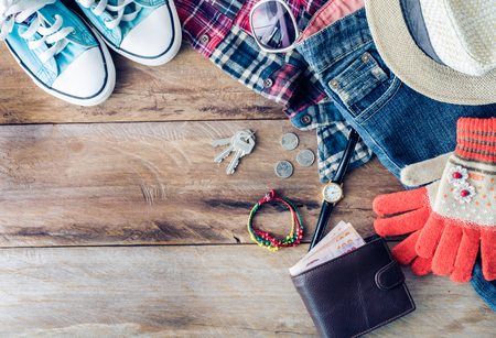 Accessories and apparel for men on a wooden floor - life styleの写真素材