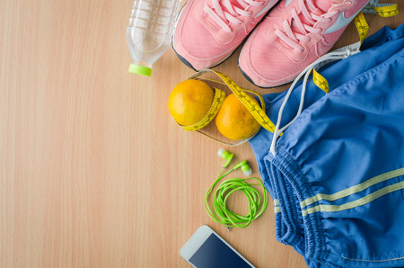 fitness concept with Exercise Equipment on wooden background.の写真素材