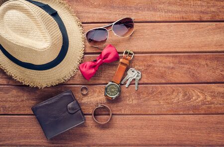 Accessories and apparel for men on a wooden floor - life style