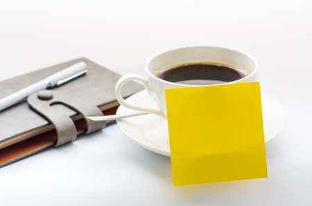 coffee cup, notebook on white backgroundの写真素材