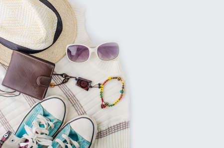 Travel accessories costume Wallet, watch, shoes, hat on a white background along for the trip.の写真素材