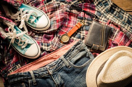 costume and accessories for men, placed on a wooden floor.の写真素材