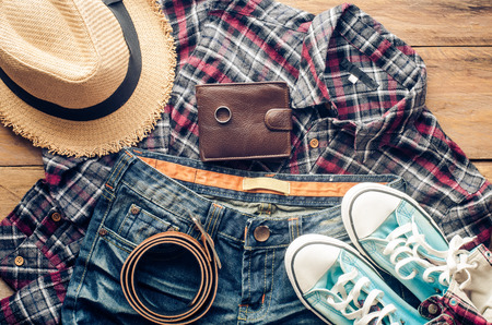 Accessories and apparel for men on a wooden floor - life styleの写真素材