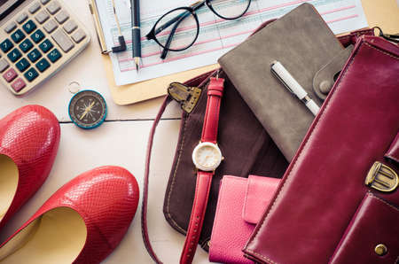 accessories for working women on wooden floorの写真素材