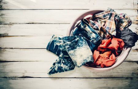 Clothes in the basket waiting to wash.の写真素材