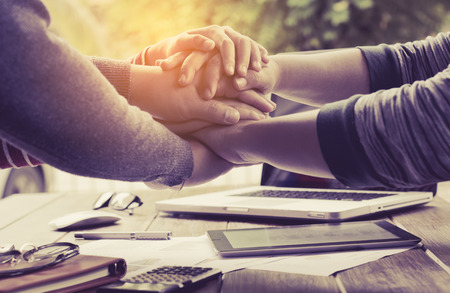 The hands are the hands of a businessman who represents the partnership business.の写真素材