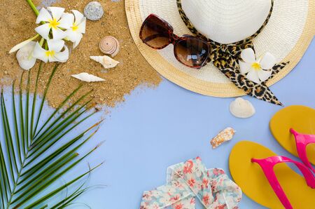 Summer accessories on blue backgroundの写真素材