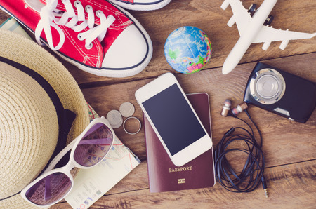Travel accessories costumes. Passports, luggage, The cost of travel maps prepared for the tripの写真素材