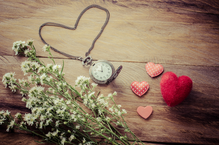 Heart and flower clock gift for love - the concept of Valentine's Day.の写真素材