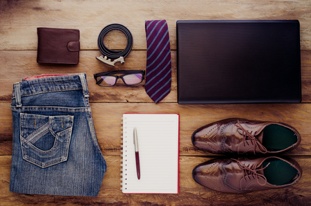 accessories of business person workplace with  costume and accessories work tools, notebook with blank copy space for text message or information contentの写真素材