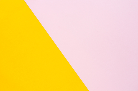 the color of the paper background is yellow and soft pink の写真素材