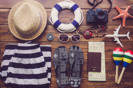 Travel accessories costumes. Passports, luggage, The cost of travel maps prepared for the tripの写真素材