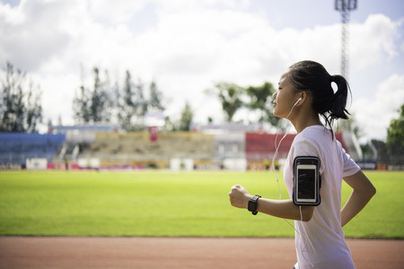 Teenage girls are rehearsing on the track.の写真素材
