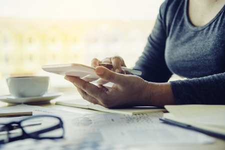 Business women working with tablets and laptops in the office.の写真素材