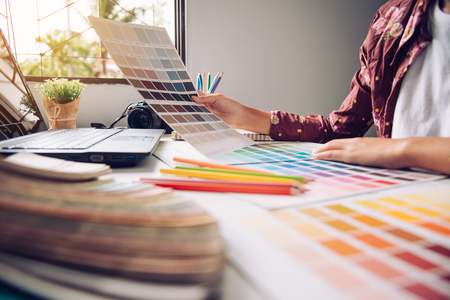 designer graphic creative ,creativity woman  working on laptop and designing  coloring colour ideas styleの写真素材