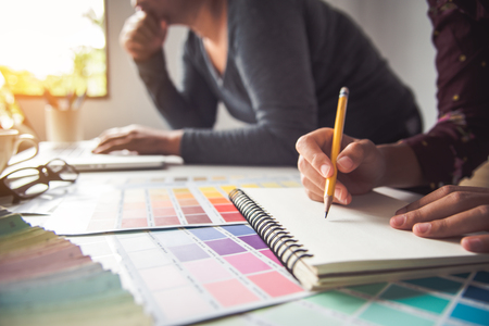 designer graphic creative ,creativity woman  working on laptop and designing  coloring color ideas styleの写真素材