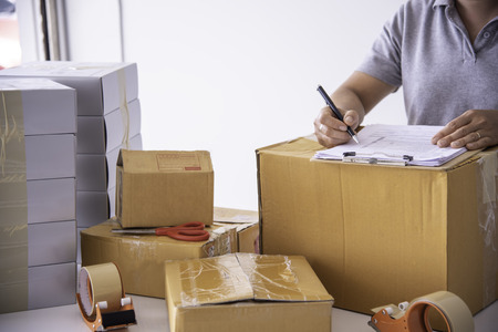 shipping staff are checking the product before shipping to the customer