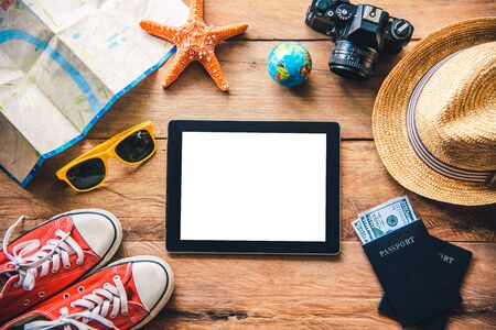 Travel accessories costumes. Passports, luggage, The cost of travel maps prepared for the tripの写真素材