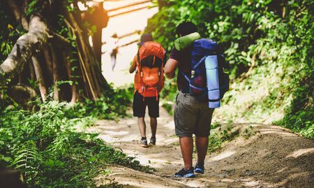 Travelers and friends with backpacks hiking Journey Travel lifestyle trek Conceptの写真素材