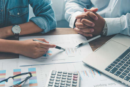 group of business people working and communicating together in the office With the charging of graphs for analysis, conceptual analysis and business planningの写真素材