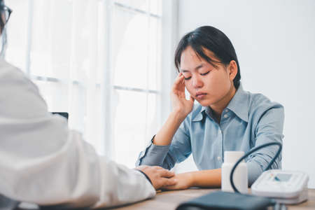 Patients suffering from depression come to consult a psychiatrist for advice and treatment guidelines.の写真素材
